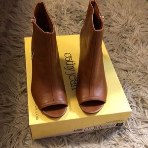 Brown leather open toe bootie.